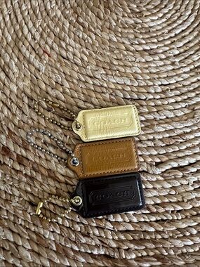 Patent leather Coach hangtags bag charm.